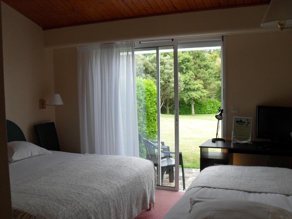 Logis Hotel Val De Vienne Le Vigeant Rom bilde