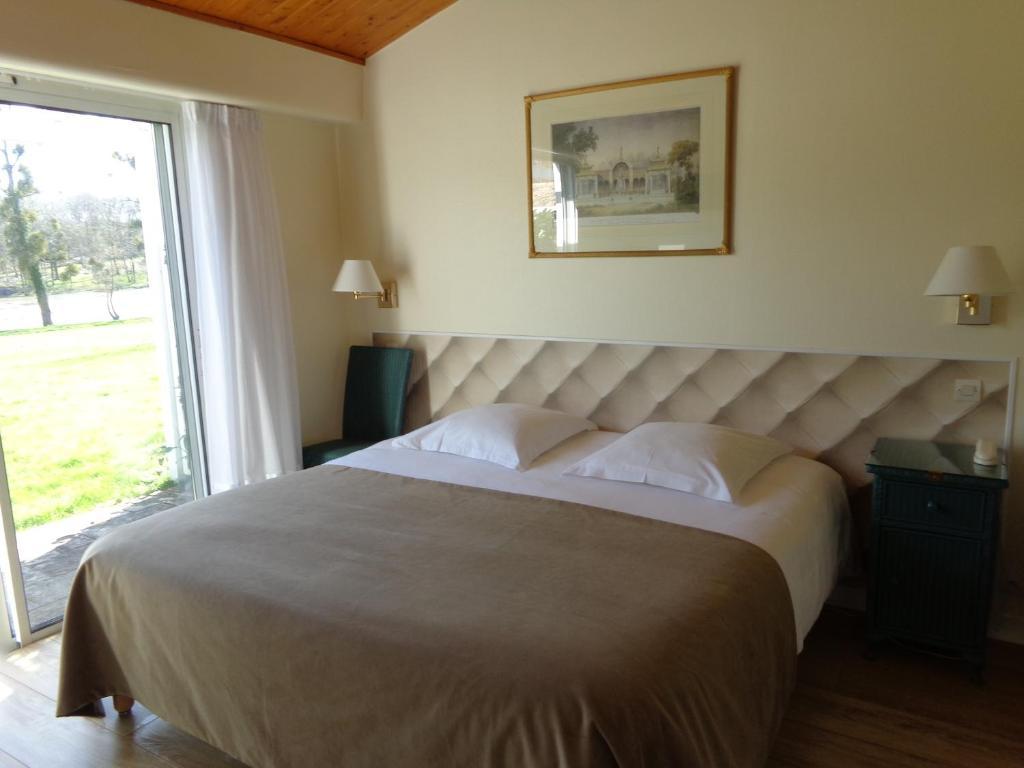Logis Hotel Val De Vienne Le Vigeant Rom bilde